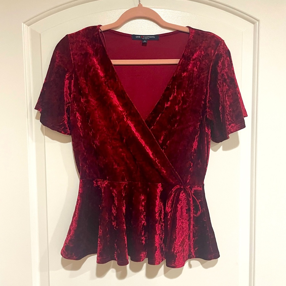 Red crushed velvet peplum top